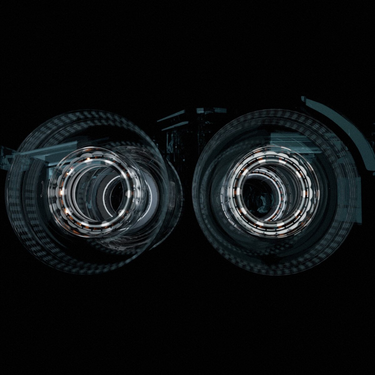 Abstract image showing two circular, symmetrical structures resembling camera lenses or futuristic machinery against a dark background. The circles have intricate, reflective patterns with a glowing effect.